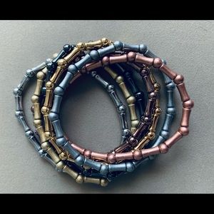 Seven Piece Metallic Bracelet Set